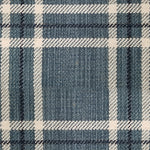 Wool broadloom carpet swatch in a plaid print in shades of tan, navy and black.