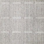 Wool broadloom carpet swatch in a plaid print in shades of gray, light blue and cream.