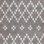 Wool broadloom carpet swatch in a repeating diamond print in light gray on a brown field.