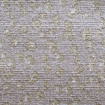 Wool broadloom carpet swatch in a painterly floral pattern in beige and cream on a mauve field.