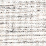 Wool-polyester broadloom carpet swatch in a multicolor beige, tan and white weave.