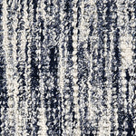 Wool-polyester broadloom carpet swatch in a multicolor cream, navy and charcoal.