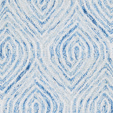 Wool broadloom carpet swatch in a painterly diamond pattern in white and blue.