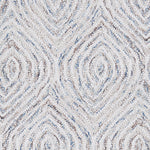 Wool broadloom carpet swatch in a painterly diamond pattern in cream, blue and brown.