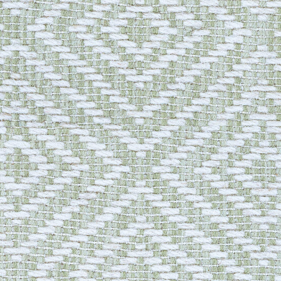 Wool broadloom carpet swatch in a woven geometric diamond print in sage and cream.