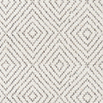 Wool broadloom carpet swatch in a graduated diamond print in dark gray on a cream field.