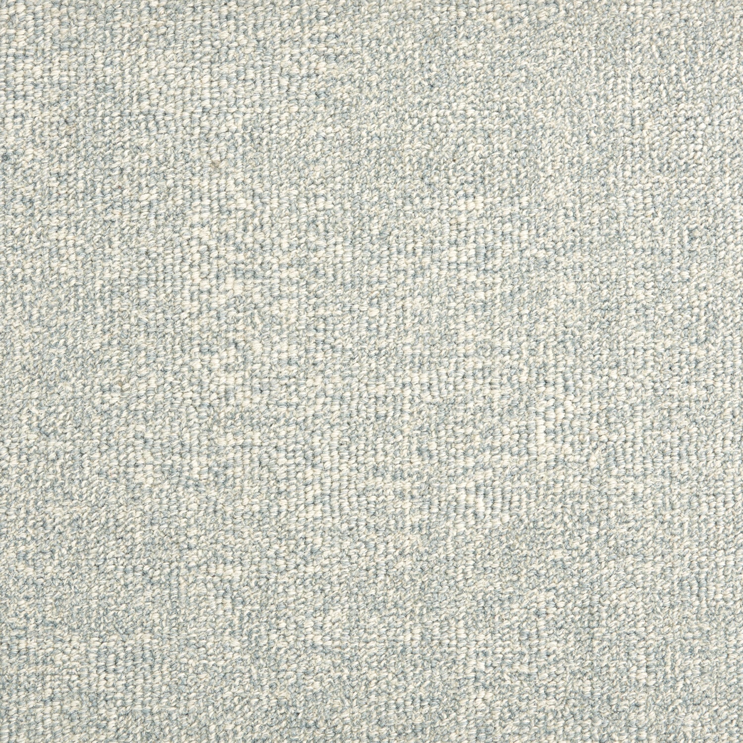 Wool broadloom carpet swatch in a textured weave in mottled cream and light blue.