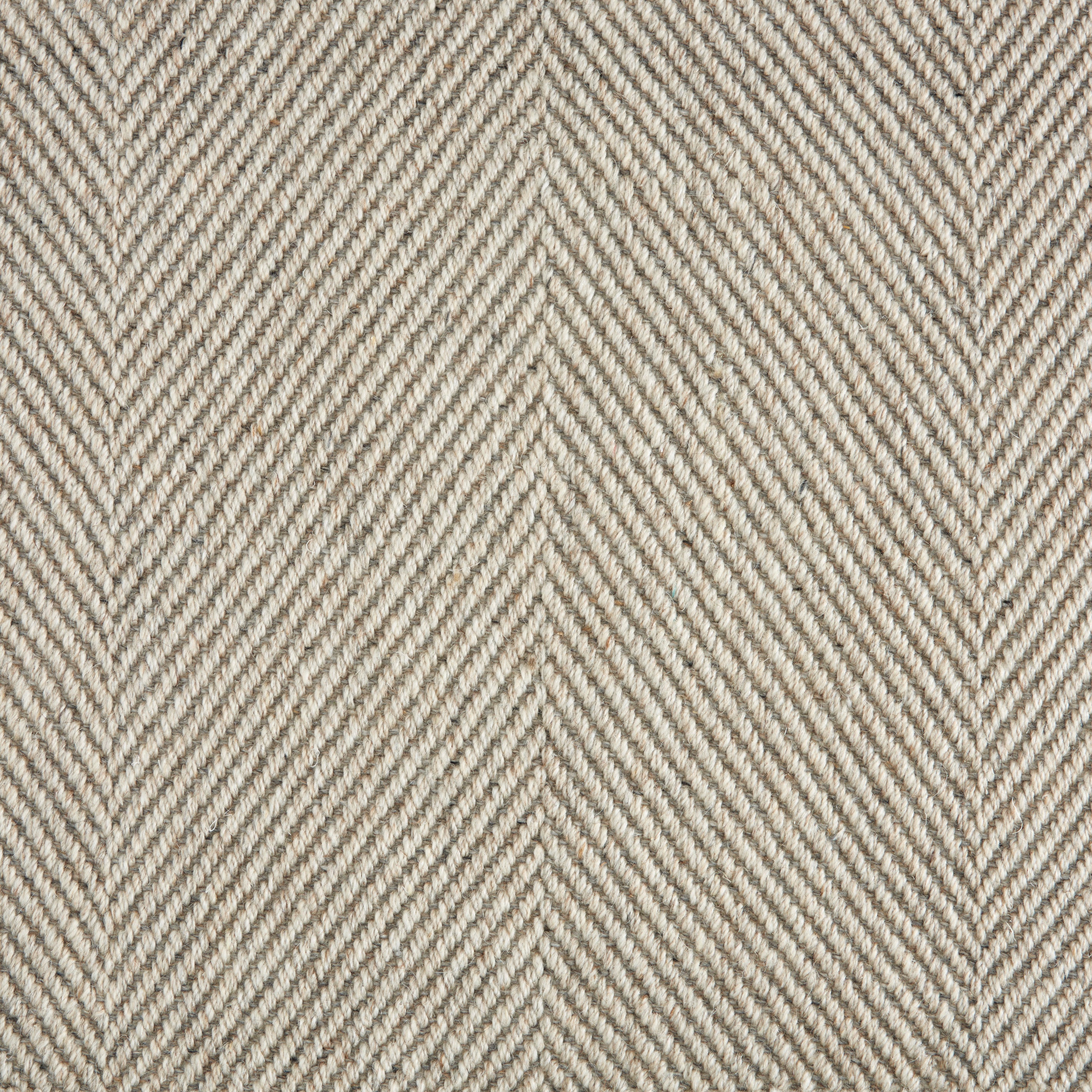 Wool-blend broadloom carpet swatch in a flat herringbone weave in cream and brown.