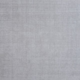 Nylon broadloom carpet swatch in a textured weave in iridescent gray.