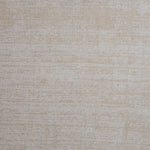 Nylon broadloom carpet swatch in a textured weave in iridescent cream.