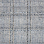 Wool-blend broadloom carpet swatch in a plaid tweed weave in gray-blue and silver.