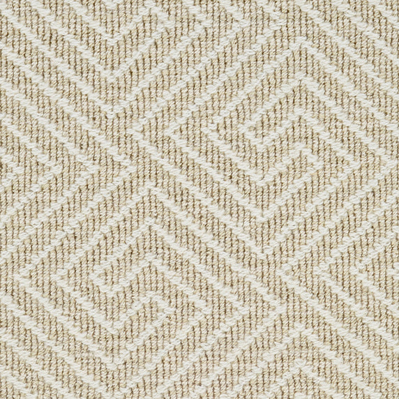 Wool broadloom carpet swatch in a high-pile interlocking geometric pattern in white and tan.