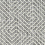 Wool broadloom carpet swatch in a high-pile interlocking geometric pattern in cream and gray.