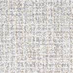 Wool broadloom carpet swatch in a high-pile weave in mottled white, cream and tan.