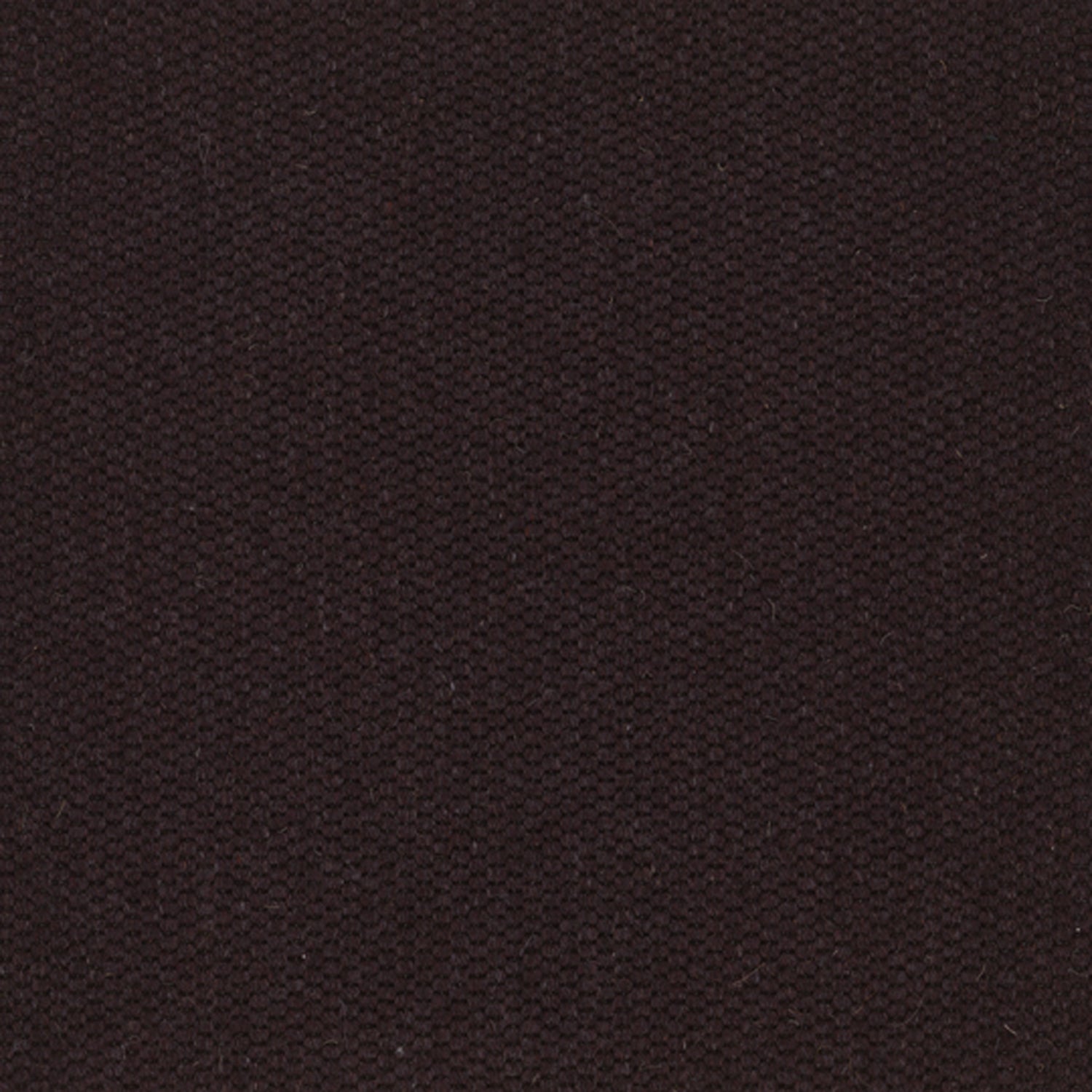 Wool broadloom carpet swatch in a flat grid weave in dark maroon.