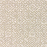 Wool-nylon broadloom carpet swatch in a geometric lattice print in cream and tan.