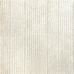 Nylon broadloom carpet swatch in a ribbed weave in ivory.