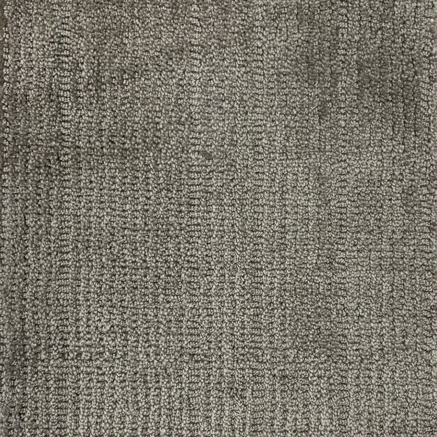 Nylon broadloom carpet swatch in a ribbed weave in slate.