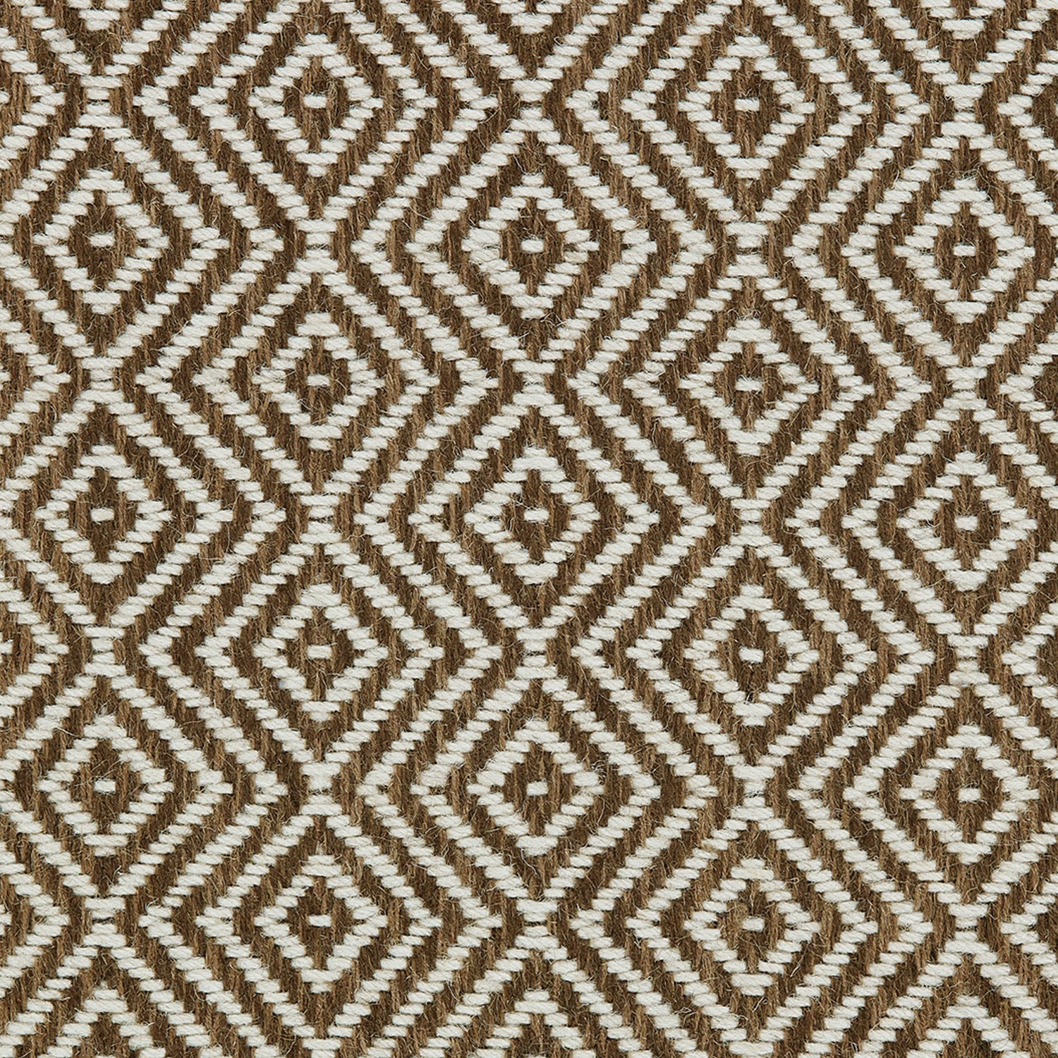 Wool broadloom carpet swatch in a diamond lattice weave in mottled brown and cream.