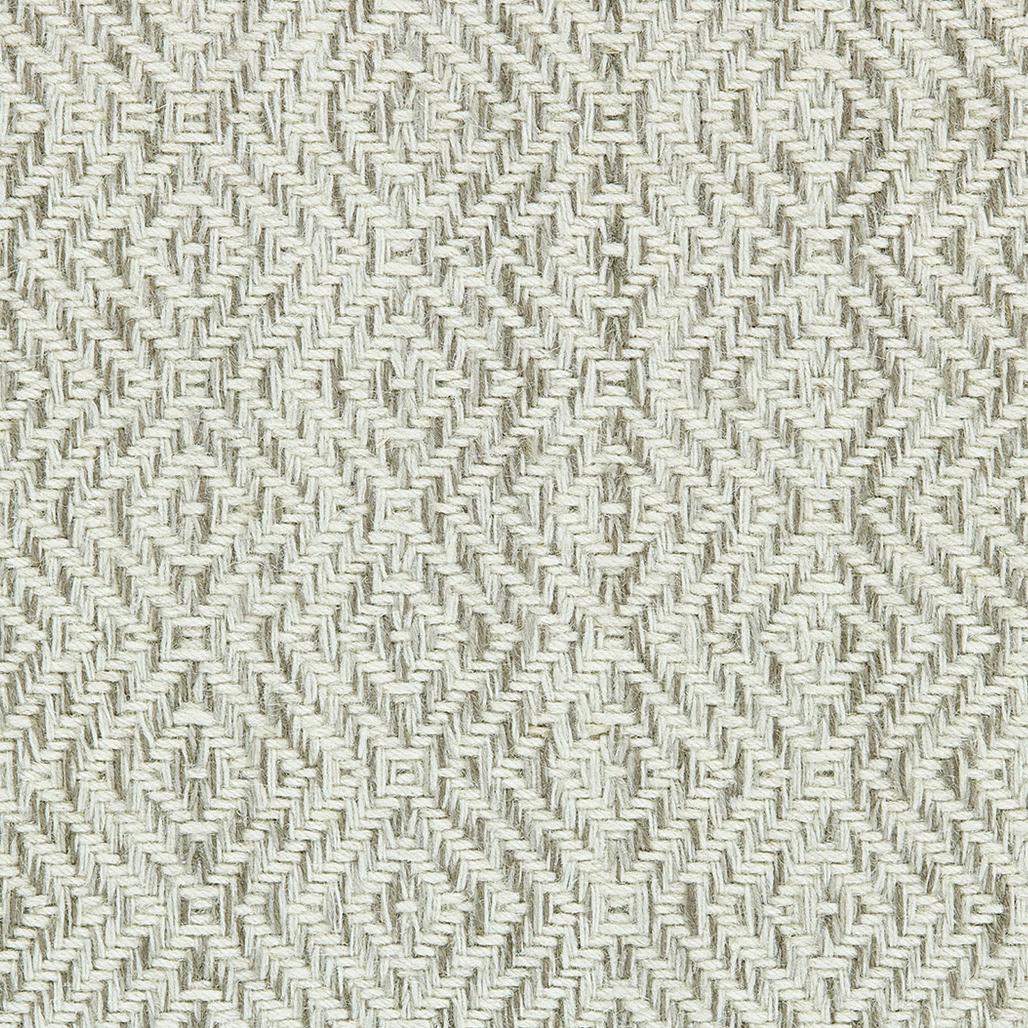 Wool broadloom carpet swatch in a diamond lattice weave in mottled silver, tan and white.