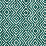 Wool broadloom carpet swatch in a diamond lattice weave in turquoise and white.