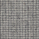 Wool broadloom carpet swatch in a chunky tweed weave in mottled white and charcoal.