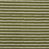 Swatch of fabric with rows of hand-drawn green and olive honeycomb shapes on a cream background.