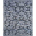 Rectangular rug with an interlocking octagon and square pattern in navy blue on a mottled blue background.