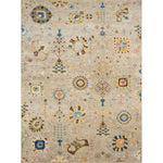 Charms rug with floral filigree designs in blue, yellow, pink, white and brown on  on a beige ground