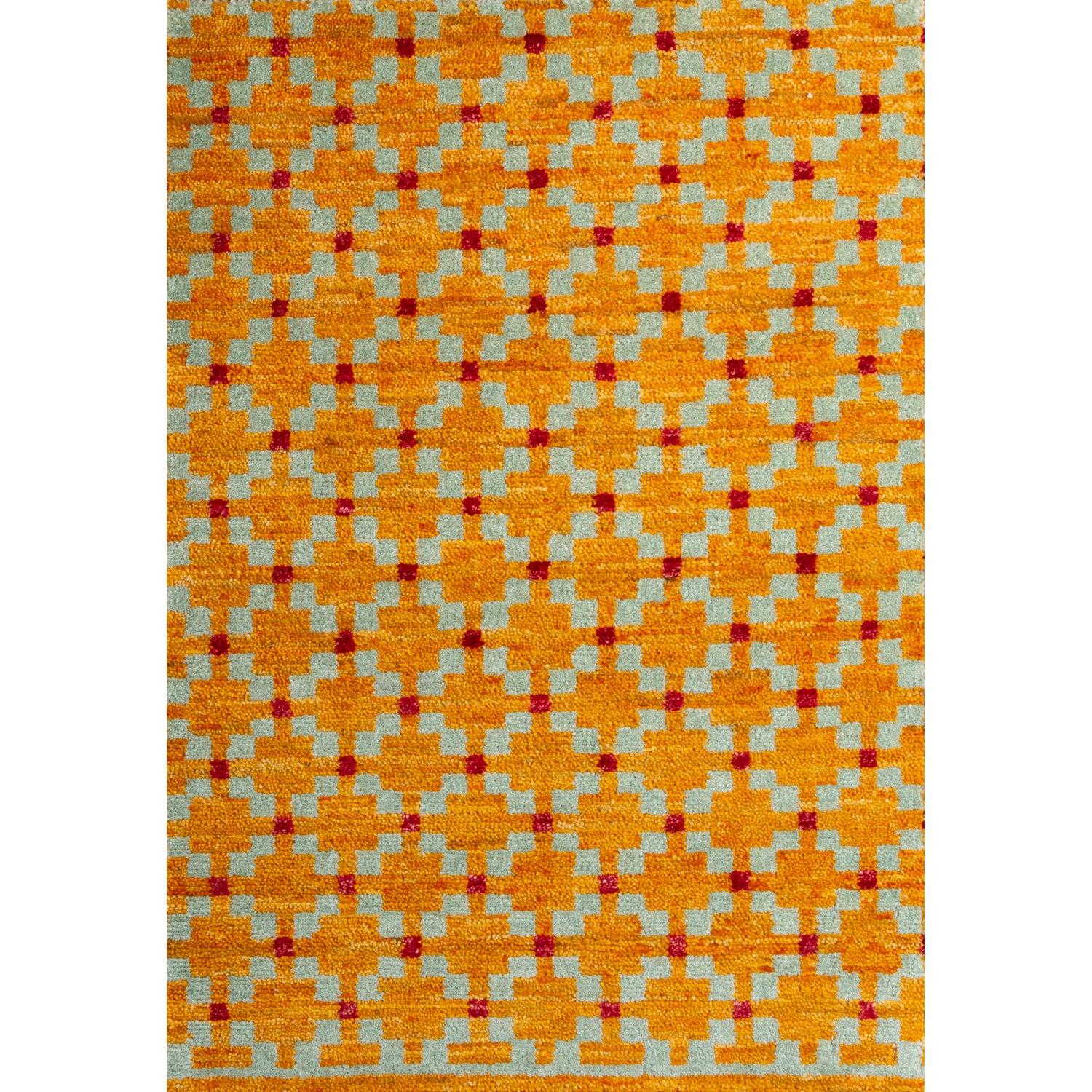 Rectangular rug in a large-scale grid pattern featuring squares of mustard, light blue and red.