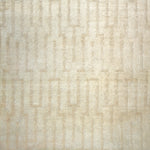 Woven high-pile rug swatch in a dimensional abstract line pattern on a cream field.