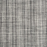 Outdoor broadloom carpet swatch in a chunky flatweave in mottled black, gray and white.