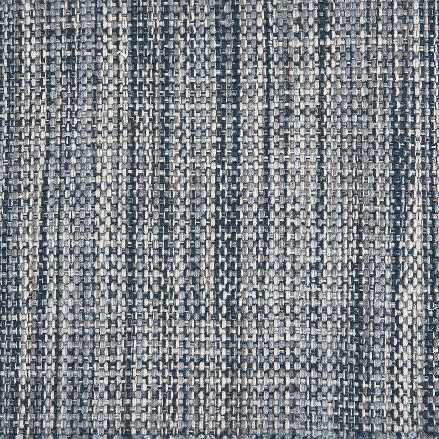 Outdoor broadloom carpet swatch in a chunky flatweave in mottled cream, gray and blue.