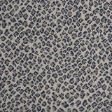 Wool-blend broadloom carpet swatch in a small scale animal print pattern in gray and navy on a silver field.