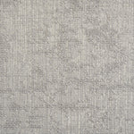 Wool-blend broadloom carpet swatch in a dimensional abstract weave in gray and cream.