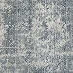 Wool-blend broadloom carpet swatch in a dimensional abstract weave in mottled gray-blue and cream.