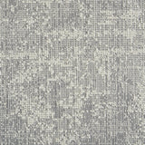 Wool-blend broadloom carpet swatch in a dimensional abstract weave in gray and cream.