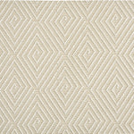 Outdoor broadloom carpet swatch in a dense repeating diamond pattern in white on a cream field.