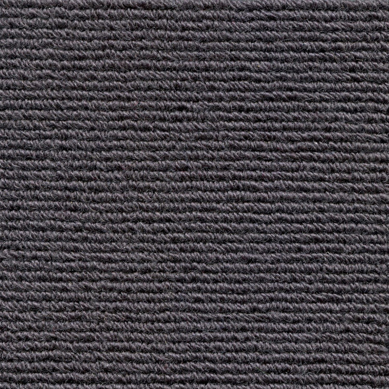 Wool broadloom carpet swatch in a chunky ribbed weave in charcoal.