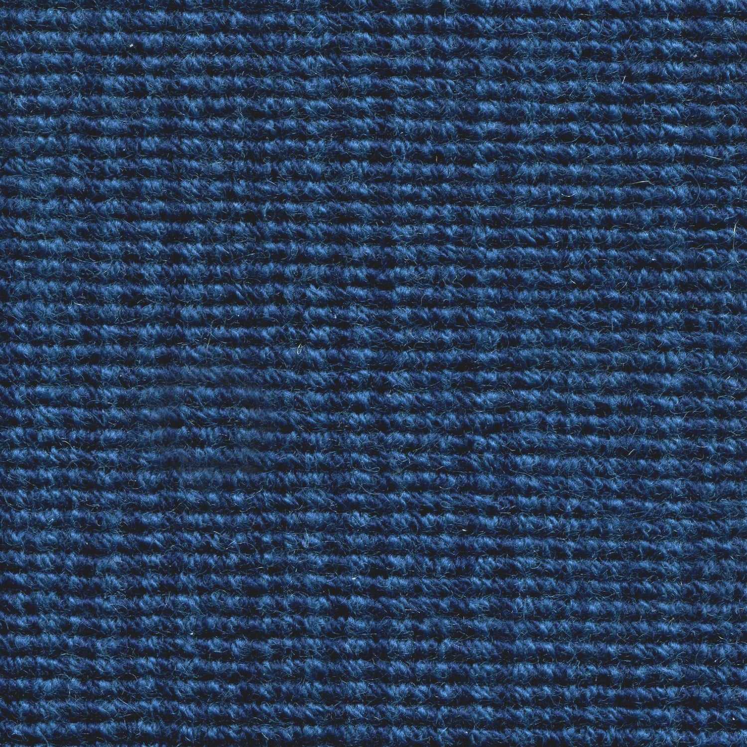 Wool broadloom carpet swatch in a chunky striped weave in blue and navy.