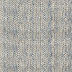 Nylon broadloom carpet swatch in a ribbed weave in mottled tan and blue.