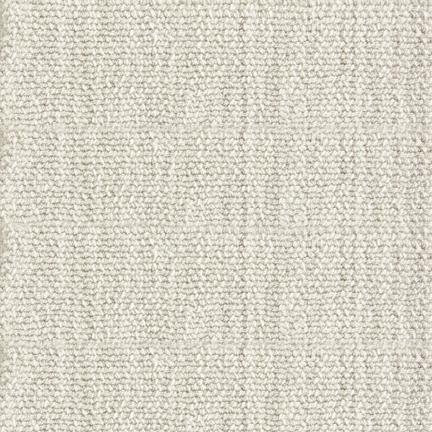 Nylon broadloom carpet swatch in a ribbed weave in mottled cream.