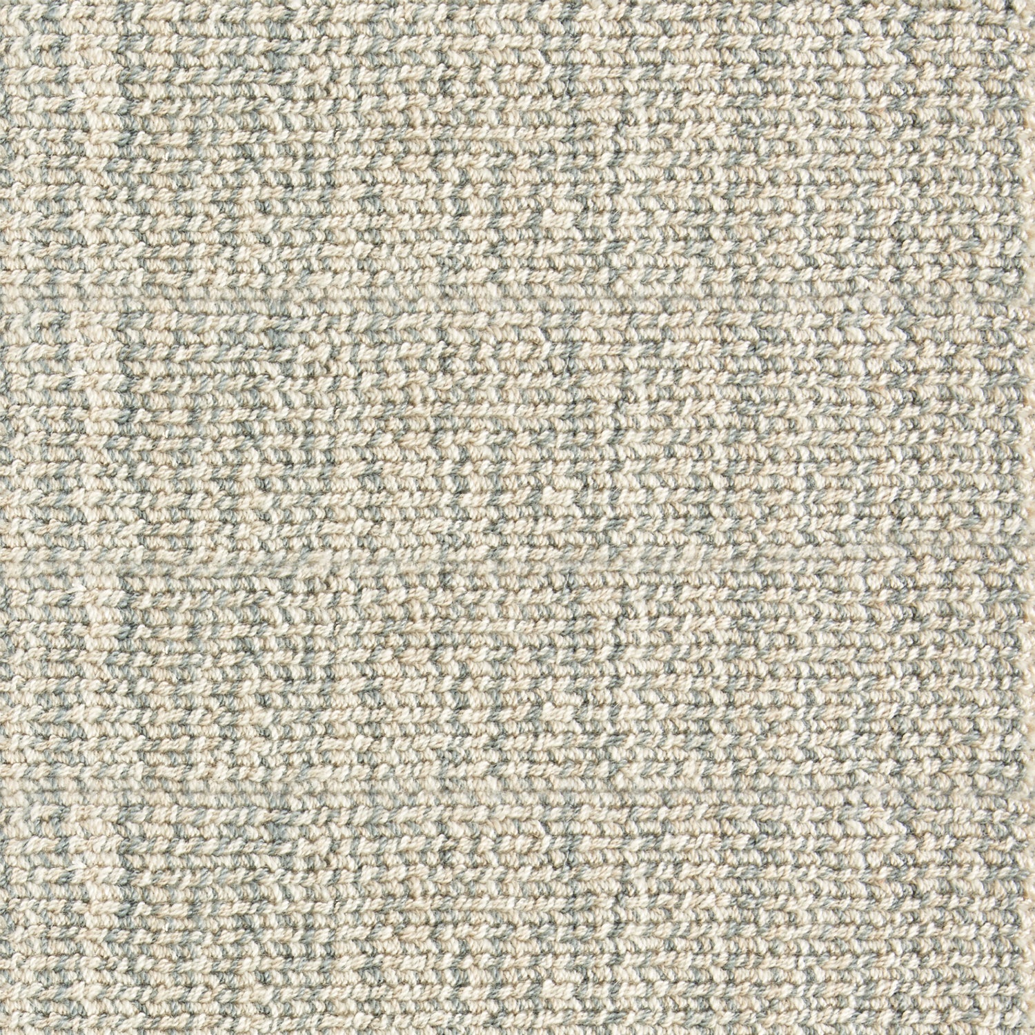 Nylon broadloom carpet swatch in a ribbed weave in mottled cream, tan and gray-blue.