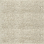 Nylon broadloom carpet swatch in a textured weave in cream.
