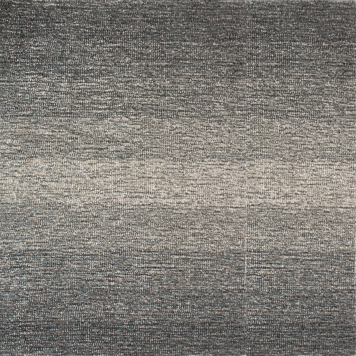 Wool broadloom carpet swatch in an ombré weave in shades of cream, gray and charcoal.