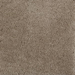 Synthetic broadloom carpet swatch in a cut pile texture in sable.