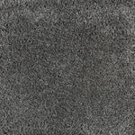 Synthetic broadloom carpet swatch in a cut pile texture in charcoal.