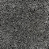 Synthetic broadloom carpet swatch in a cut pile texture in charcoal.