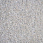 Synthetic-blend broadloom carpet swatch in an abstract textured loop weave in greige.