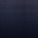 Wool-silk broadloom carpet swatch in a dimensional geometric weave in navy.